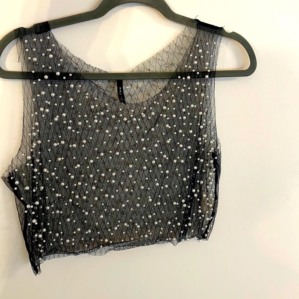 Sheer pearl covered top